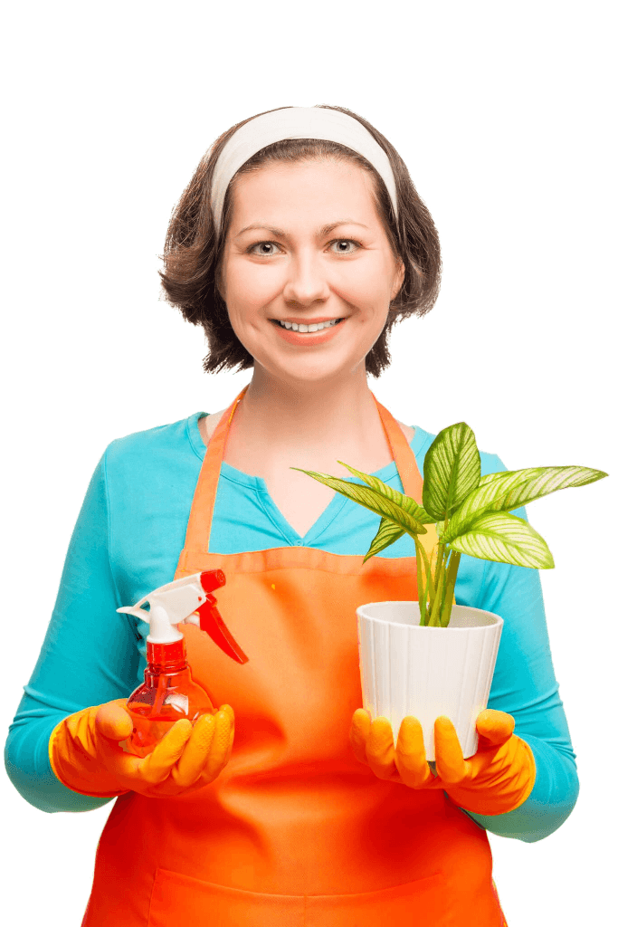 woman holding plants for lawn care and planting services in ottawa